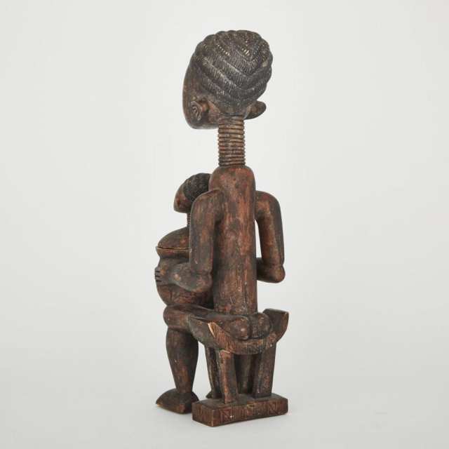 Mende Seated Female Figure Holding a Lidded Vessel, West Africa