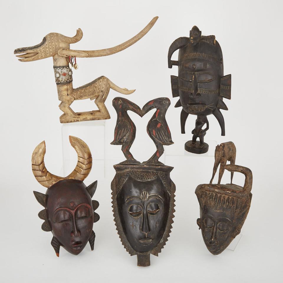 Group of Five pieces including Two Yaure Masks, Two Senufo Masks, Tia-Wara Antelope Headdress, South Africa