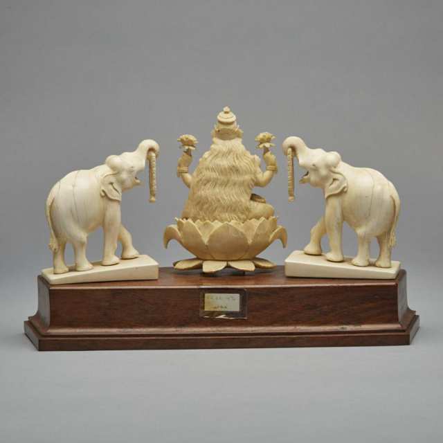 An Indian Ivory Carved Trio of Lakshmi and Elephants, Early 20th Century