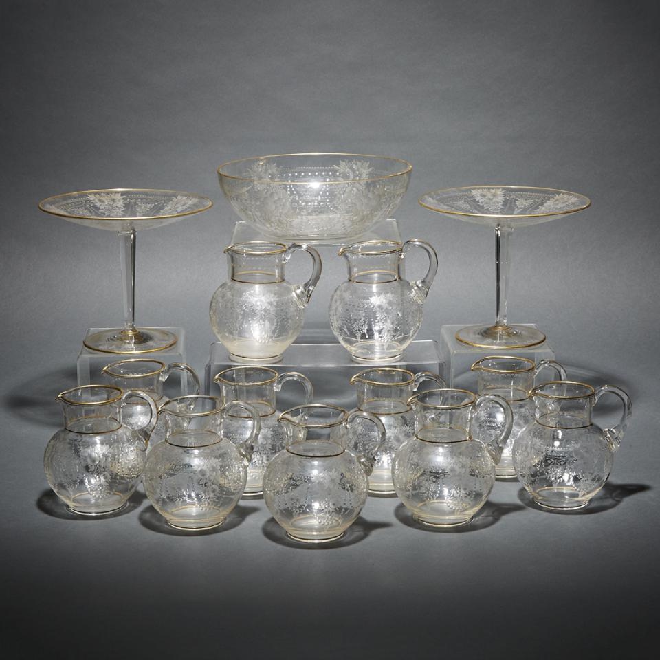 Eleven Continental Engraved and Gilt Glass Water Jugs, Two Pedestal Footed Comports and a Bowl, late 19th century