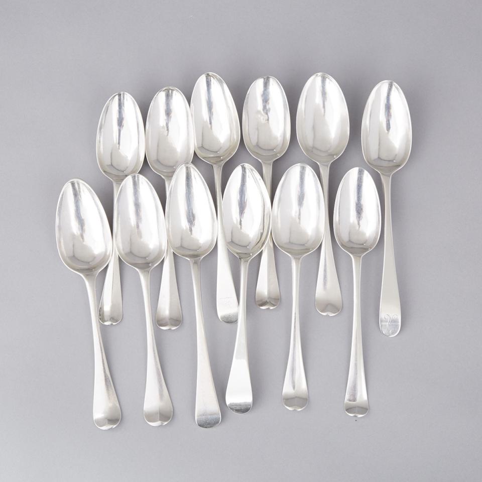 Twelve George II/III Silver Hanoverian and Old English Pattern Table Spoons, various makers, c.1729-1807