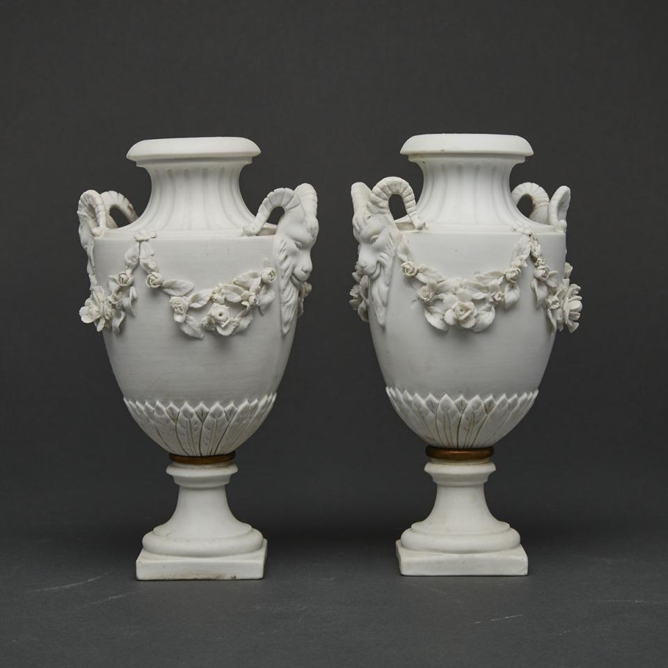 Pair of ‘Sèvres’ White Biscuit Two-Handled Vases, late 19th century