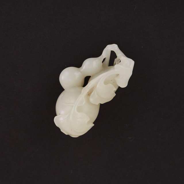 A Double Gourd Carved White Jade