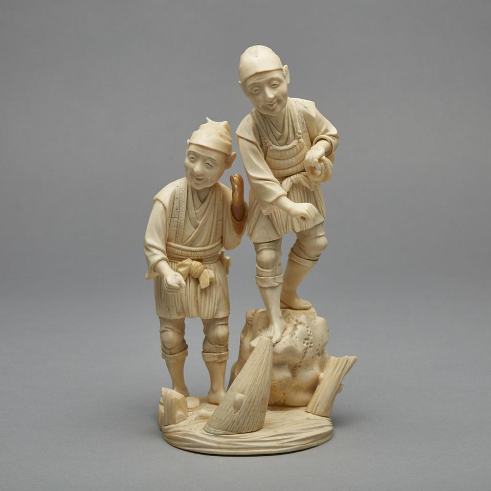 A Japanese Ivory Okimono of Two Fisherman, Early 20th Century