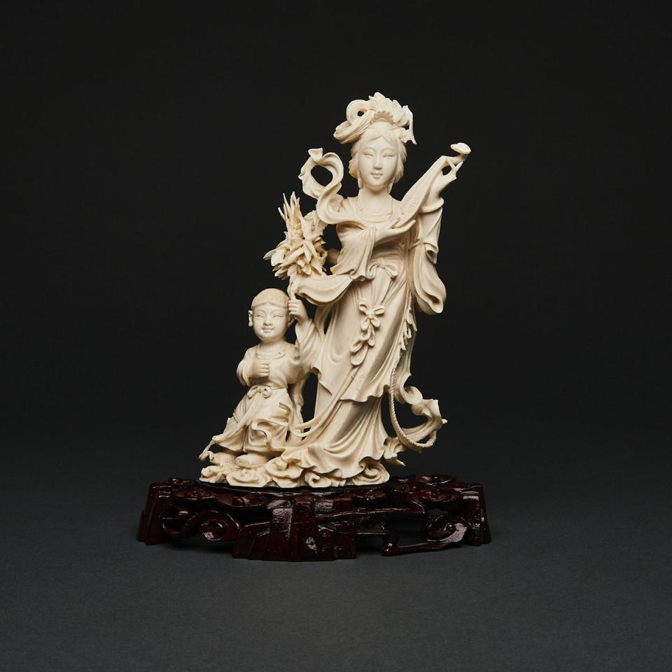 An Ivory Carving of a Lady and Boy, Circa 1940s
