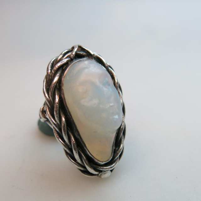 Silver Ring set with a carved moonstone