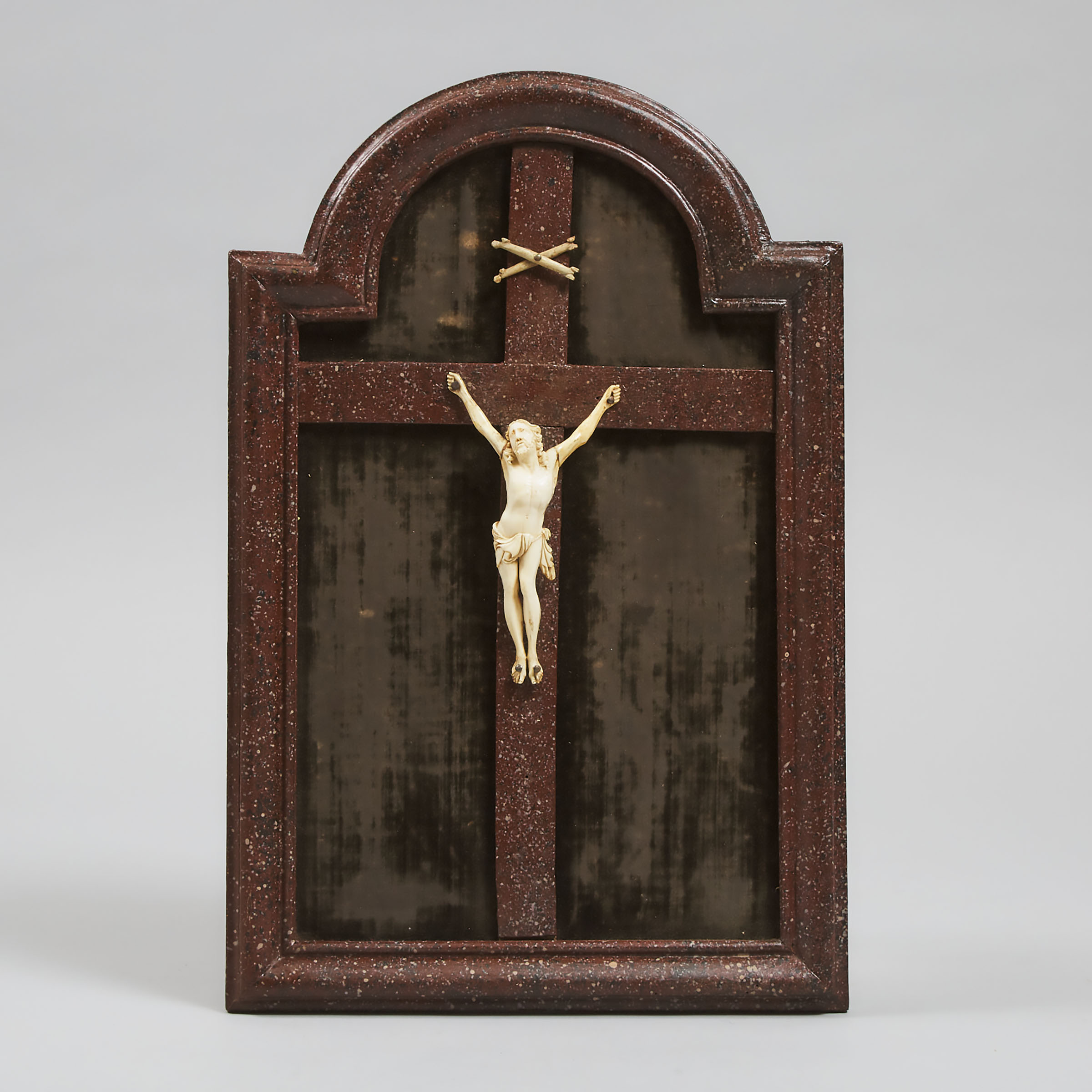 French Carved Ivory and Faux Red Porphyry Crucifixion Plaque, 18th century