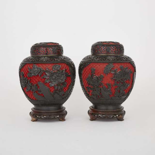A Pair of Lacquer Covered Jars