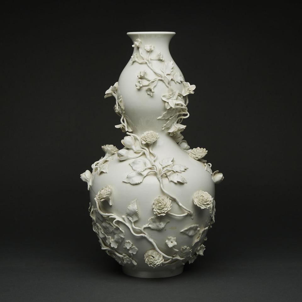 A White Moulded Double Gourd Vase