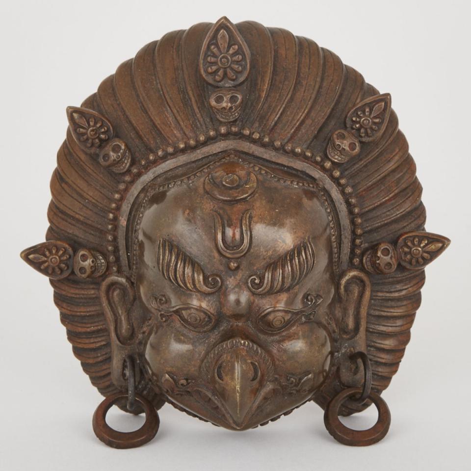 A Bronze Garuda Mask