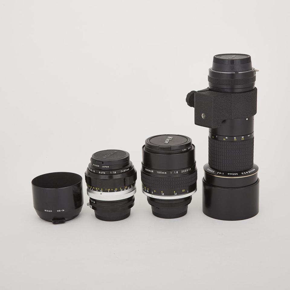 Three Nikon Nikkor Lenses and a Hood