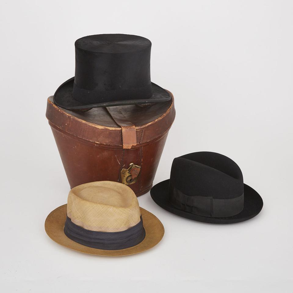 Three Mens Hats: A Silk Plush Top Hat in Leather Case, an Homberg and a Sisal Gambler. c.1930