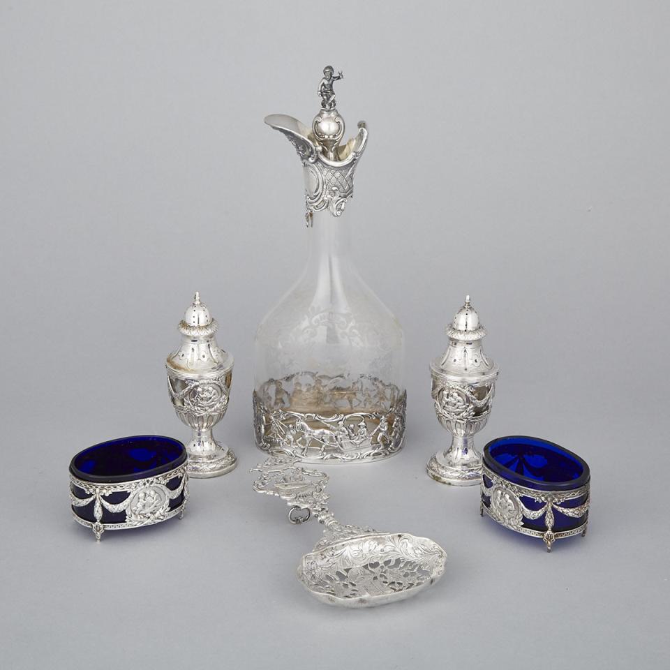 German Silver Mounted Etched Glass Decanter, Pair of Salt Cellars, Pair of Pepper Casters and a Novelty Spoon, early 20th century