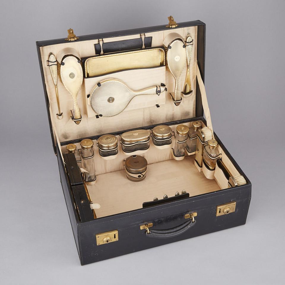 English Silver-Gilt and Etched Glass Traveling Toilet Set, Cooper Bros. and William Neale & Son, London and Birmingham, c.1920-30