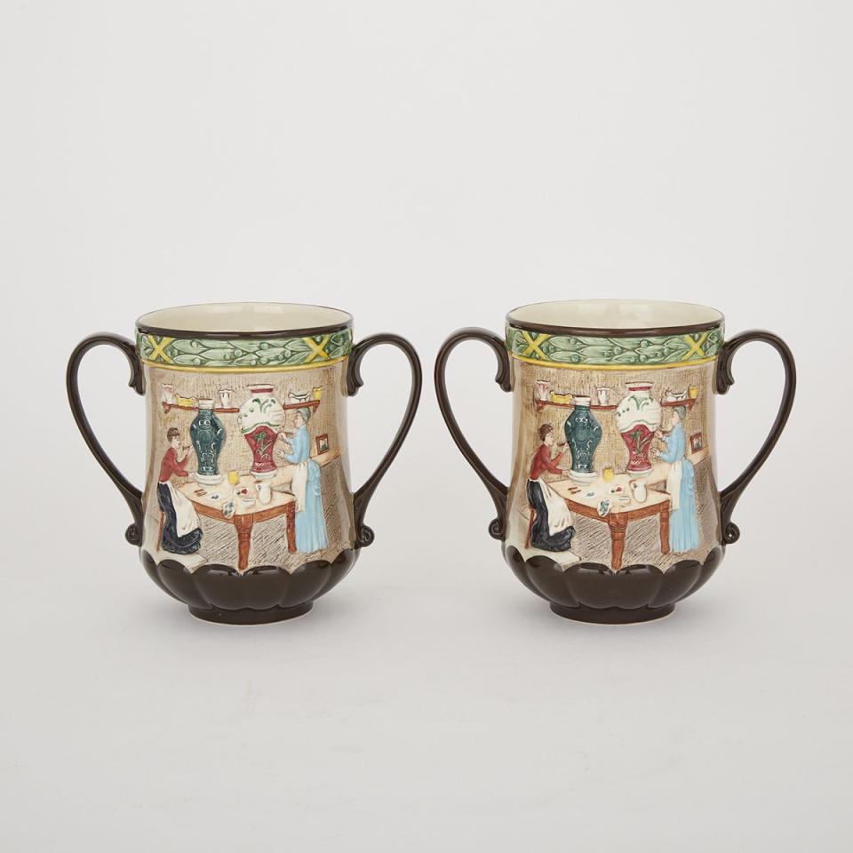 Two Royal Doulton Loving Cups, ‘Pottery in the Past’, 20th century 