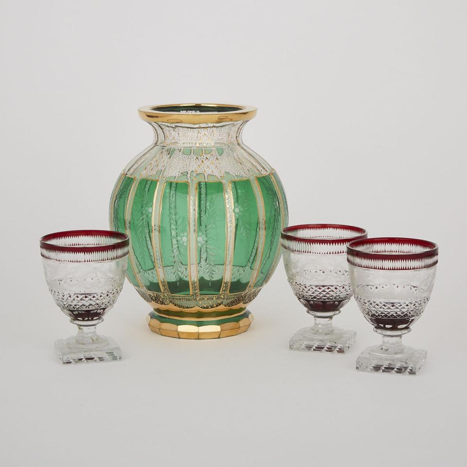 Bohemian Green Overlaid, Cut and Gilt Glass Vase and Three Red Overlaid, Cut and Engraved Goblets, late 19th century