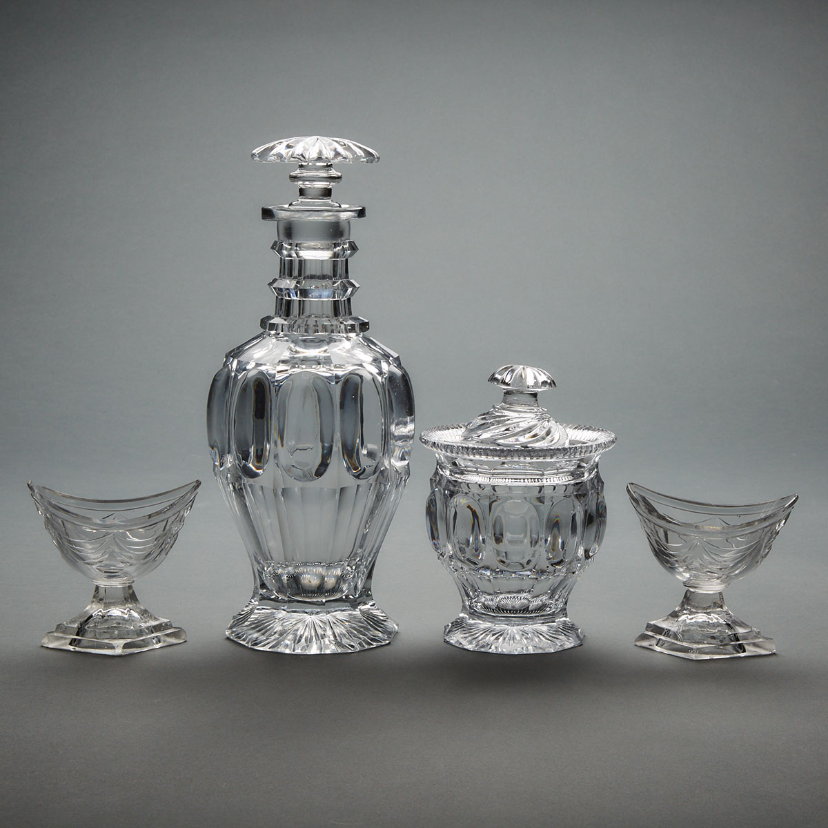 Pair of Anglo-Irish Cut Glass Salt Cellars, Covered Jar and a Decanter, late 18th/early 19th century