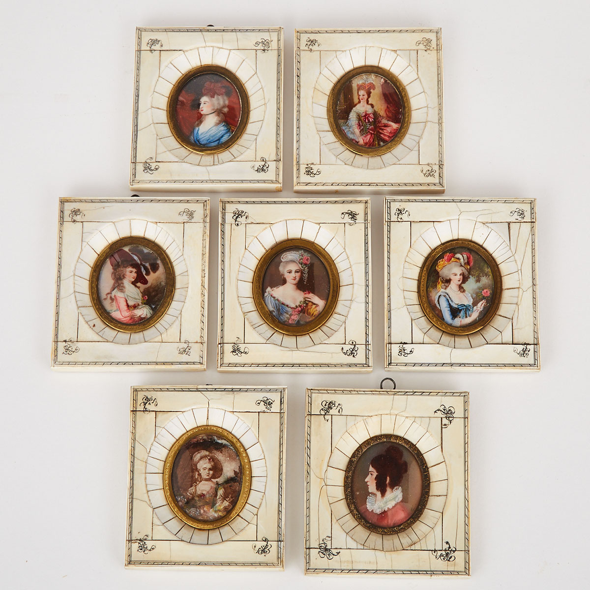 Set of Seven French Portrait Miniatures on ivory in Ivory Veneered Frames, 19th/20th century