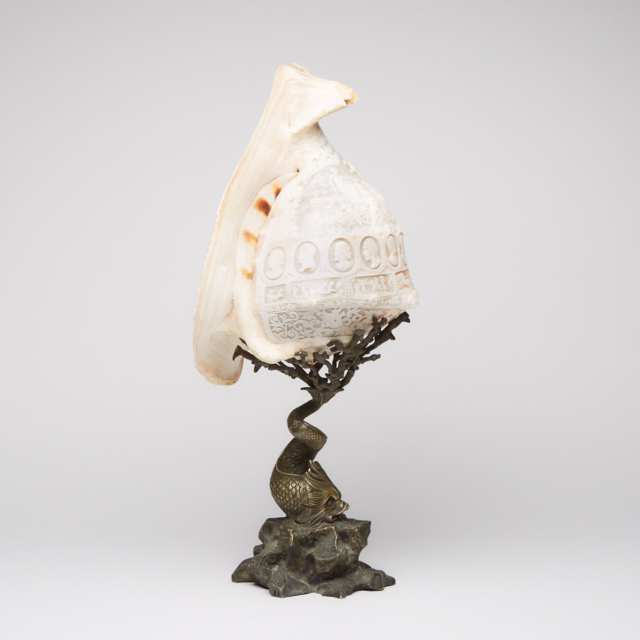 Large Italian Cameo Carved Conch Shell on Bronze Dolphin Form Stand, 19th century