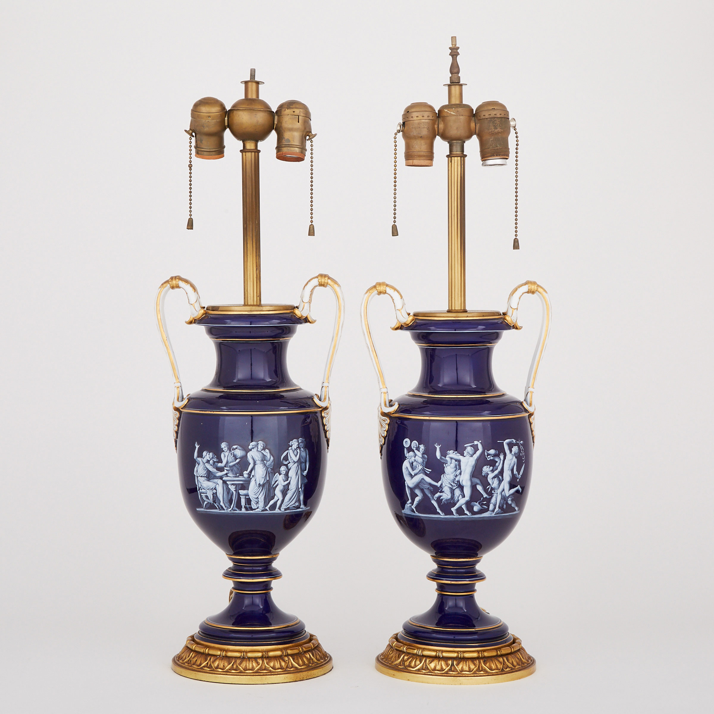 Pair of Meissen Pâte-sur-Pâte Blue Ground Two-Handled Vase-Form Table Lamps, late 19th century