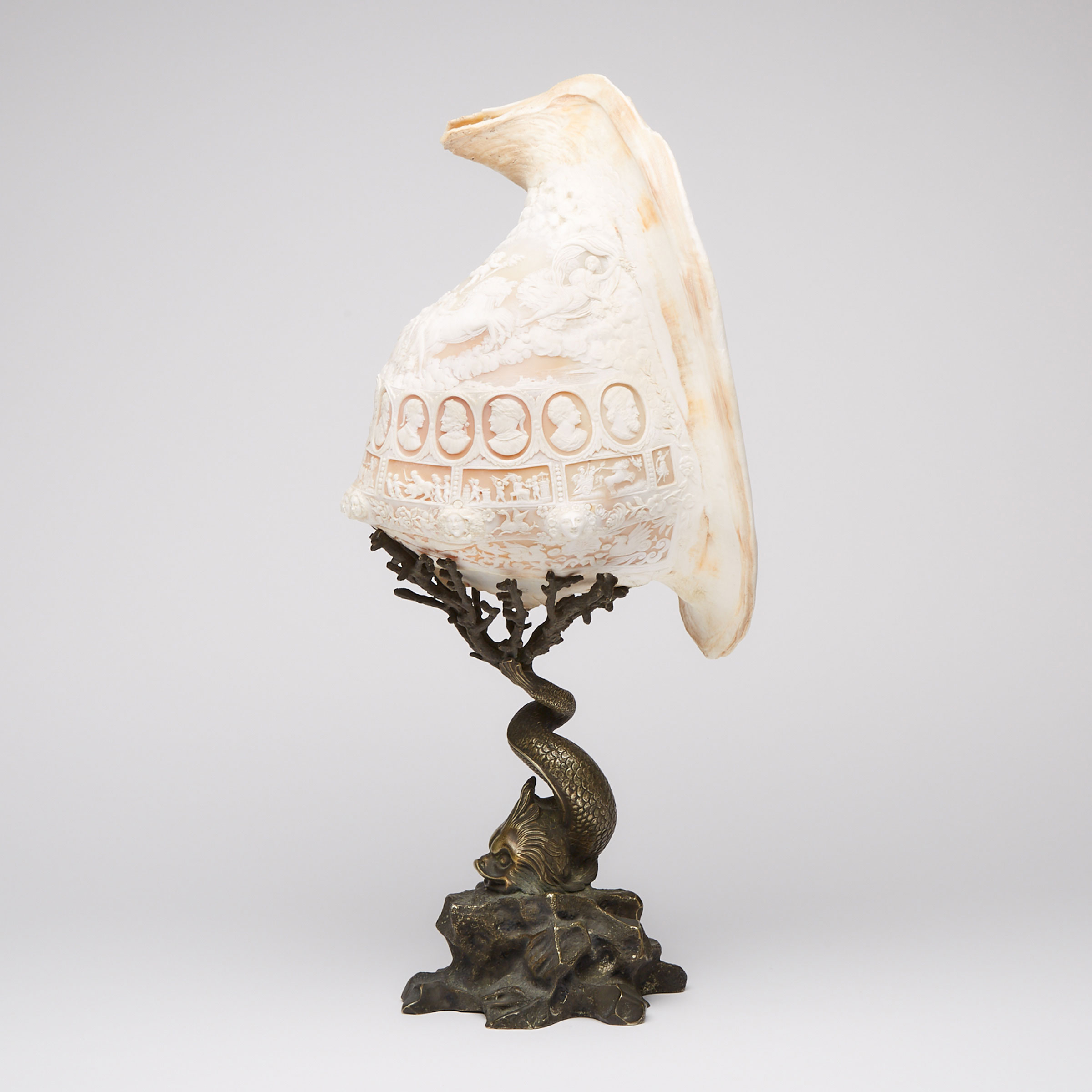 Large Italian Cameo Carved Conch Shell on Bronze Dolphin Form Stand, 19th century