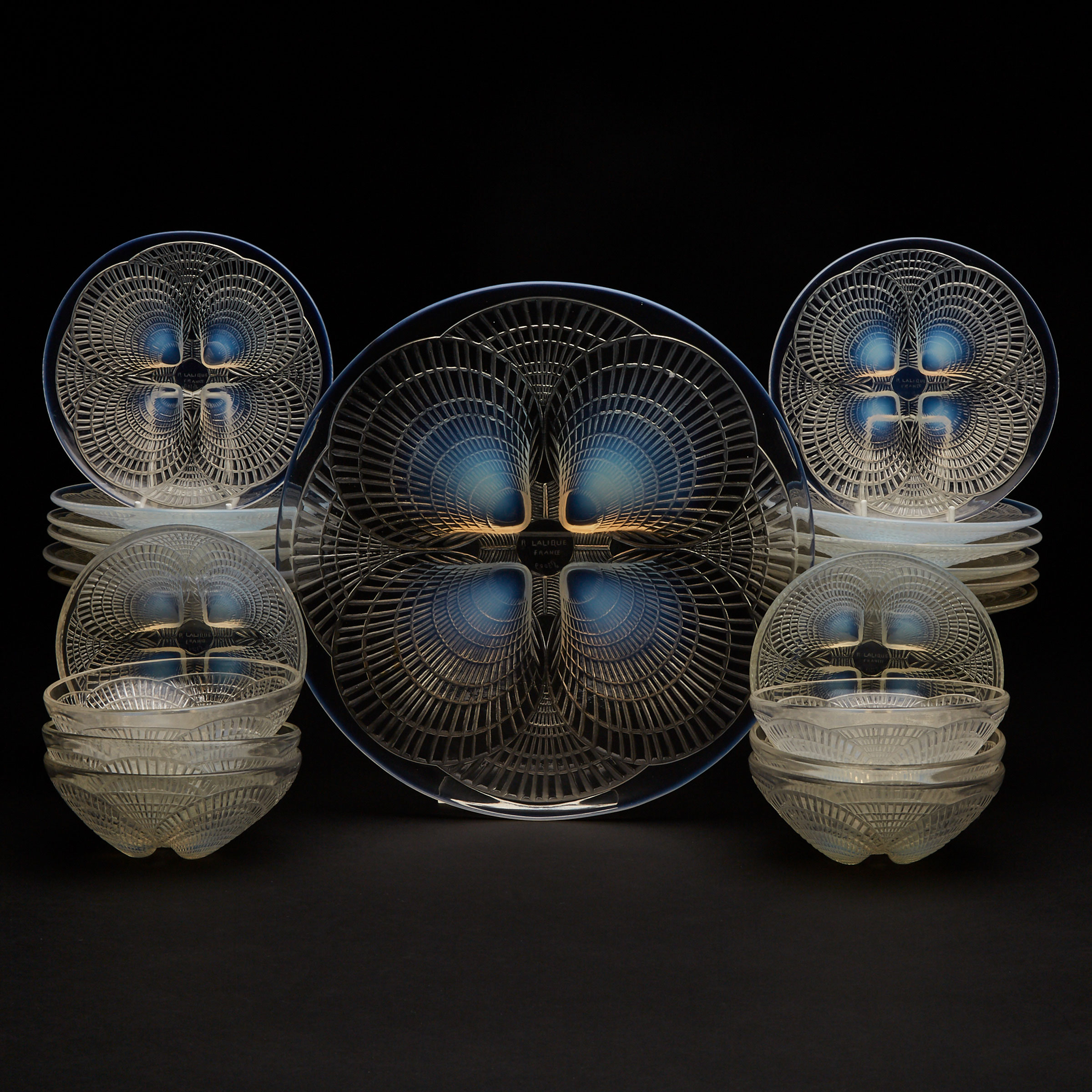 ‘Coquilles’, Twelve Lalique Moulded Opalescent Glass Plates, Eight Bowls and a Large Plate, 1930s