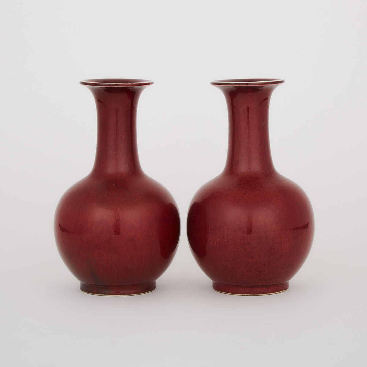 A Pair of Oxblood Red Vases