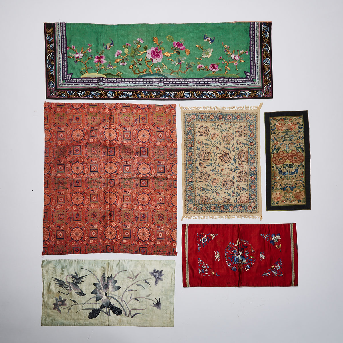 A Group of Six Chinese and Middle Eastern Textiles, 19th Century and Later