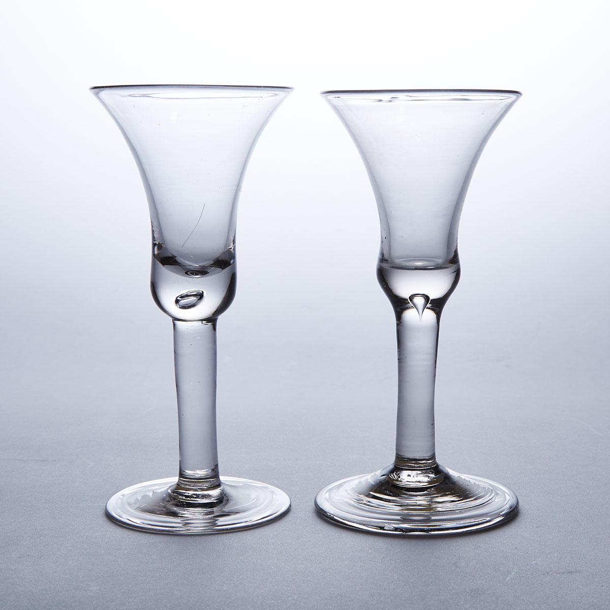 Pair of English Teared Plain Stemmed Wine Glasses, mid-18th century