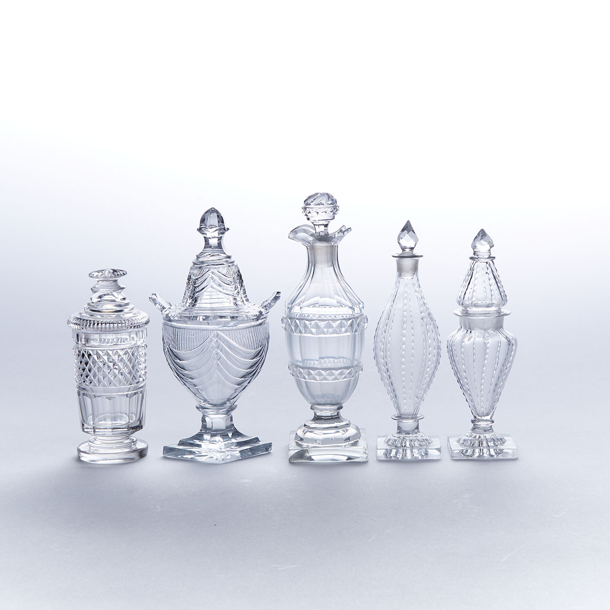 Five Anglo-Irish Cut Glass Condiment Bottles and Jars, late 18th/early 19th century