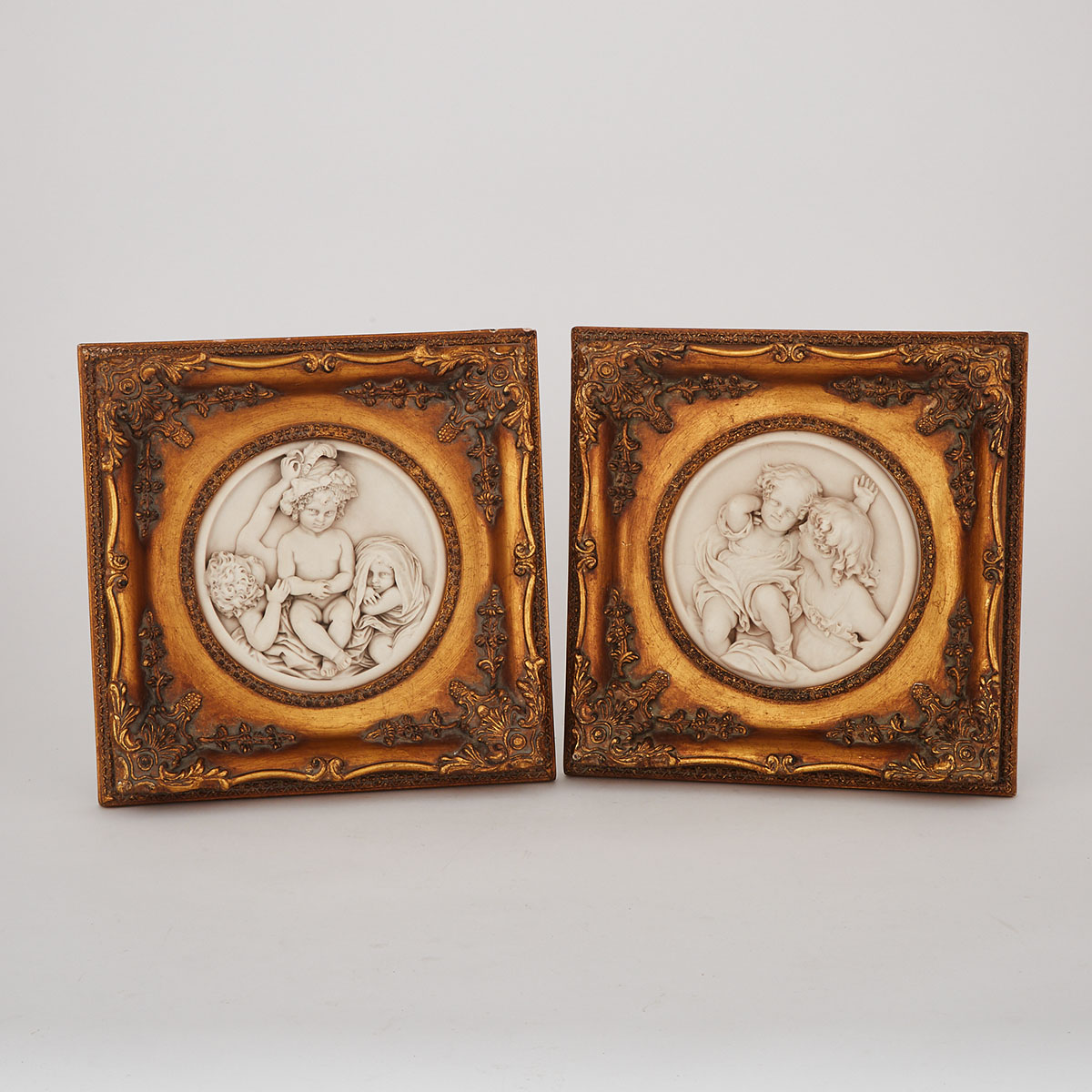 Pair of Italian Cast Composite Marble Relief Roundels, mid 20th century 