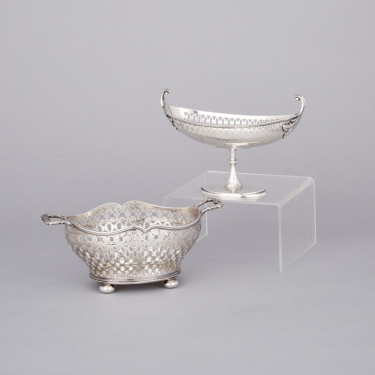 English Silver Pedestal-Footed Small Comport and Pierced Two-Handled Oval Basket, Henry Matthews, Birmingham, 1920 and 1928 