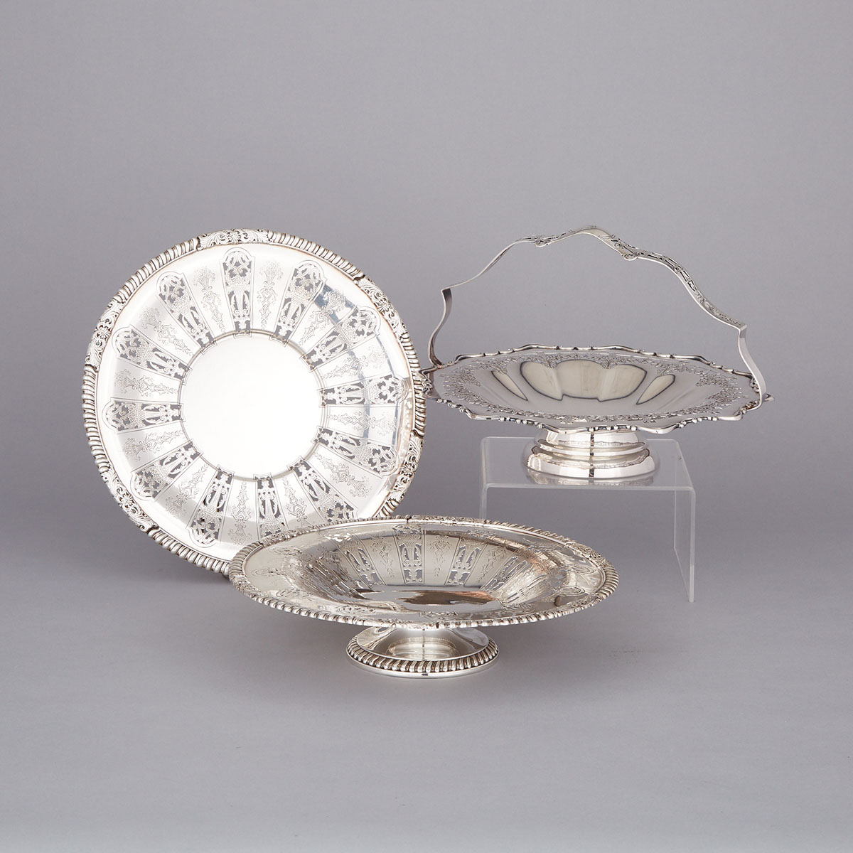 Canadian Silver Pierced Cake Basket, Low Comport and a Circular Dish, Roden Brothers, Toronto, Ont., early 20th century
