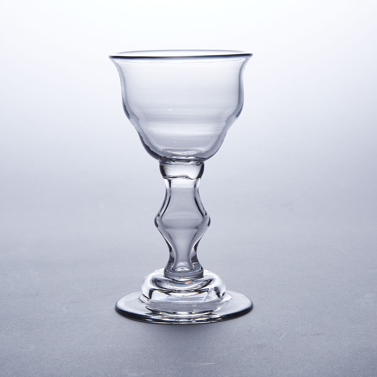 English Angular Knopped Balustroid Stemmed Sweetmeat or Champagne Glass, c.1730 