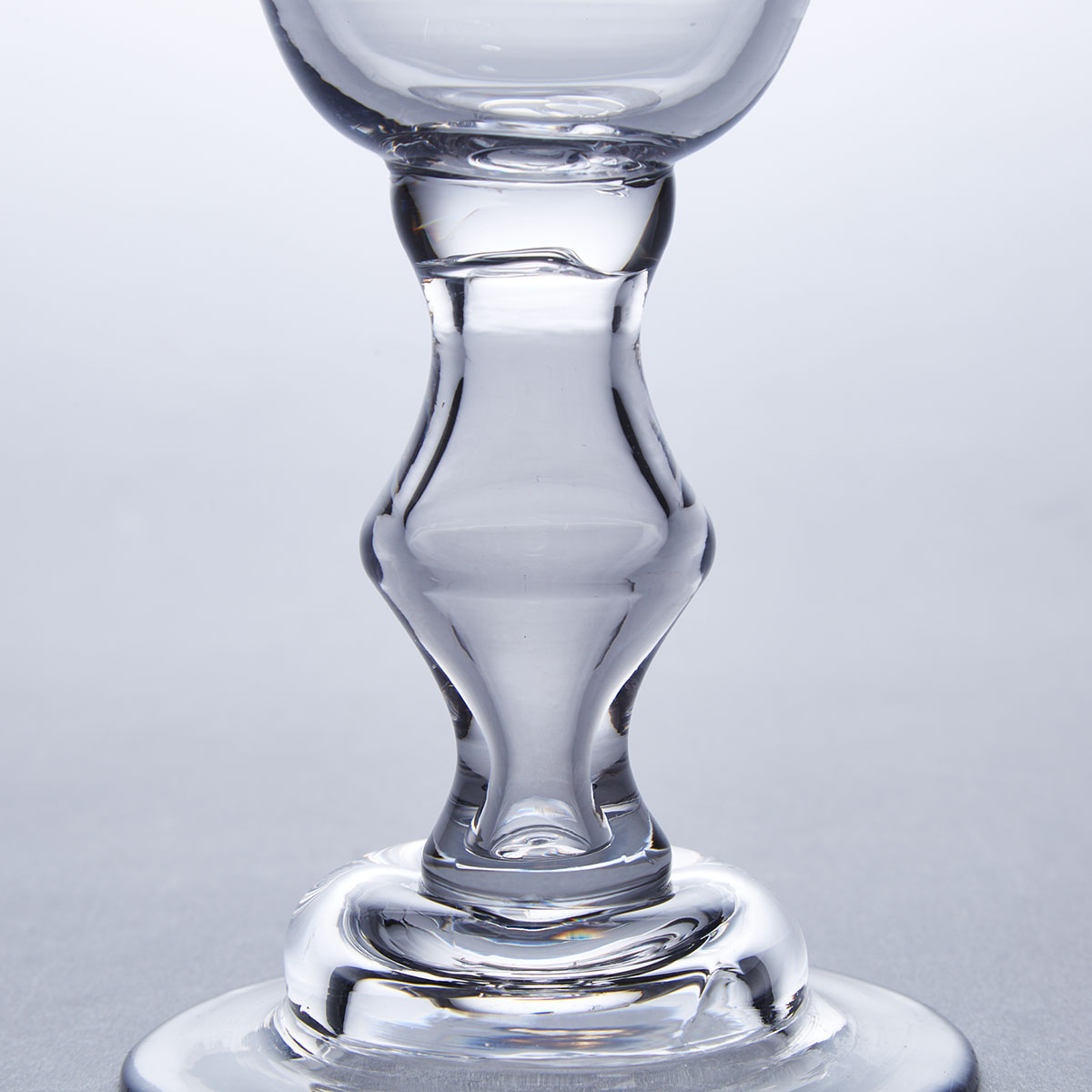 English Angular Knopped Balustroid Stemmed Sweetmeat or Champagne Glass, c.1730 