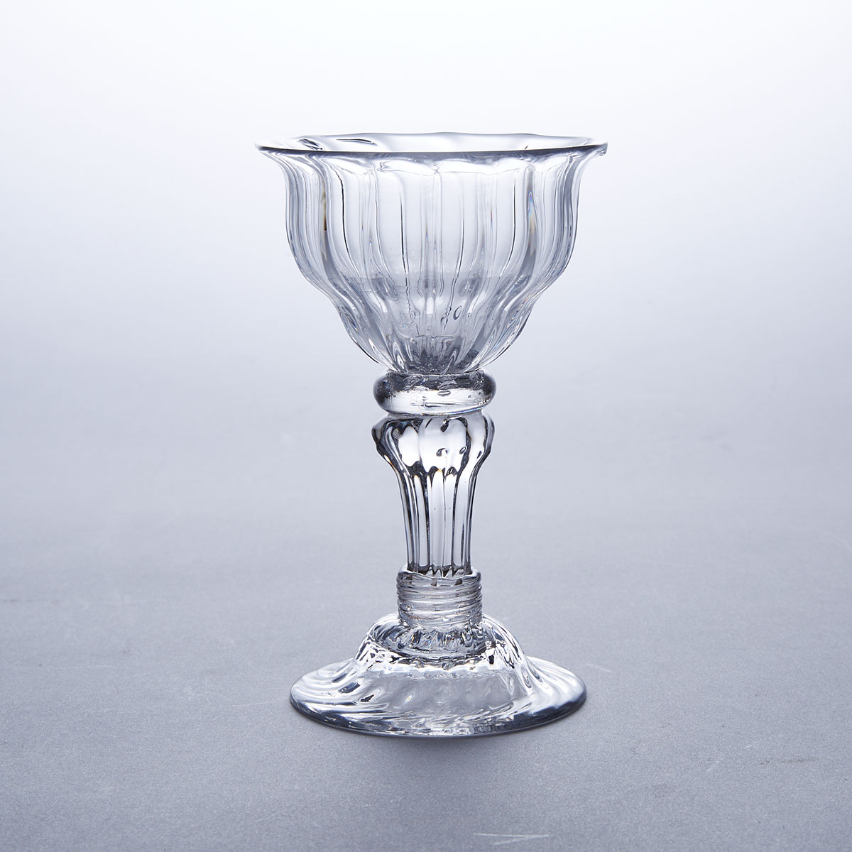 English Teared Knopped Moulded Pedestal Stemmed Sweetmeat or Champagne Glass, mid-18th century