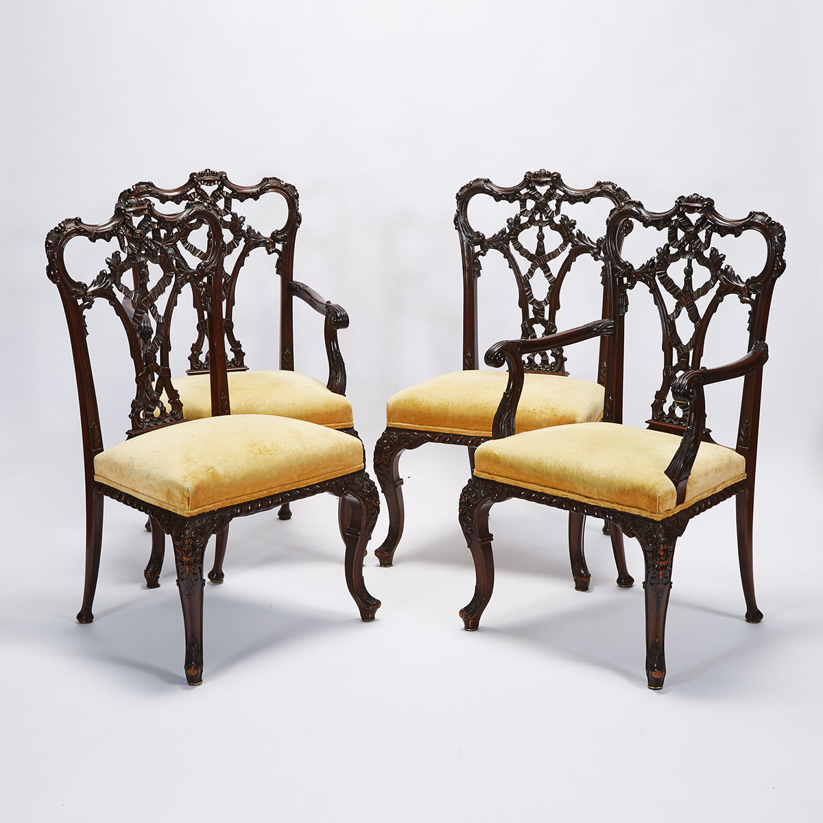 Set of Four Chippendale Style Carved Mahogany Ribbon Back Dining Chairs, circa 1920