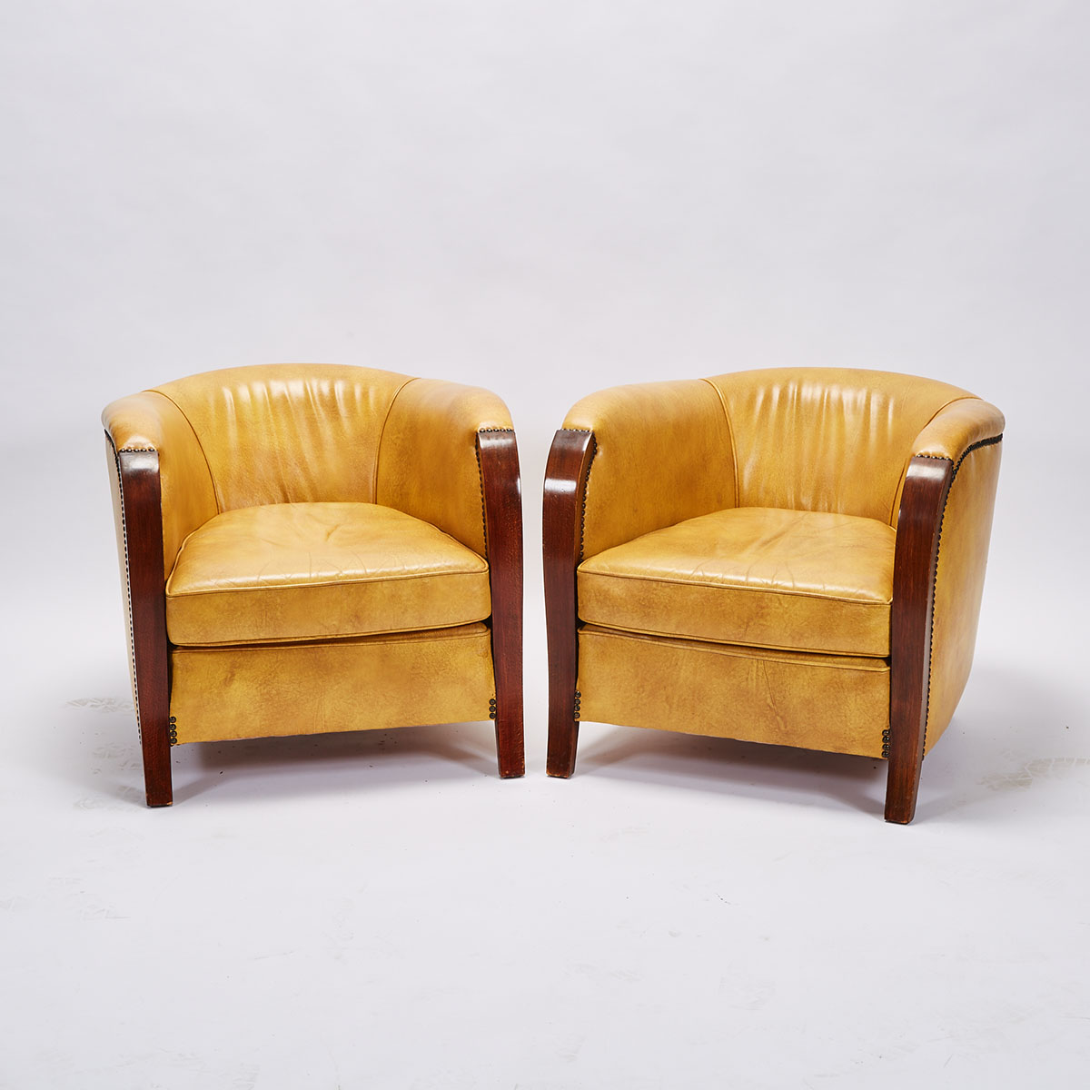 Pair of French Art Deco Mahogany Club Chairs, mid 20th century