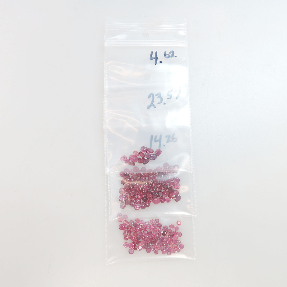 Quantity Of Unmounted Full And Oval Cut Rubies