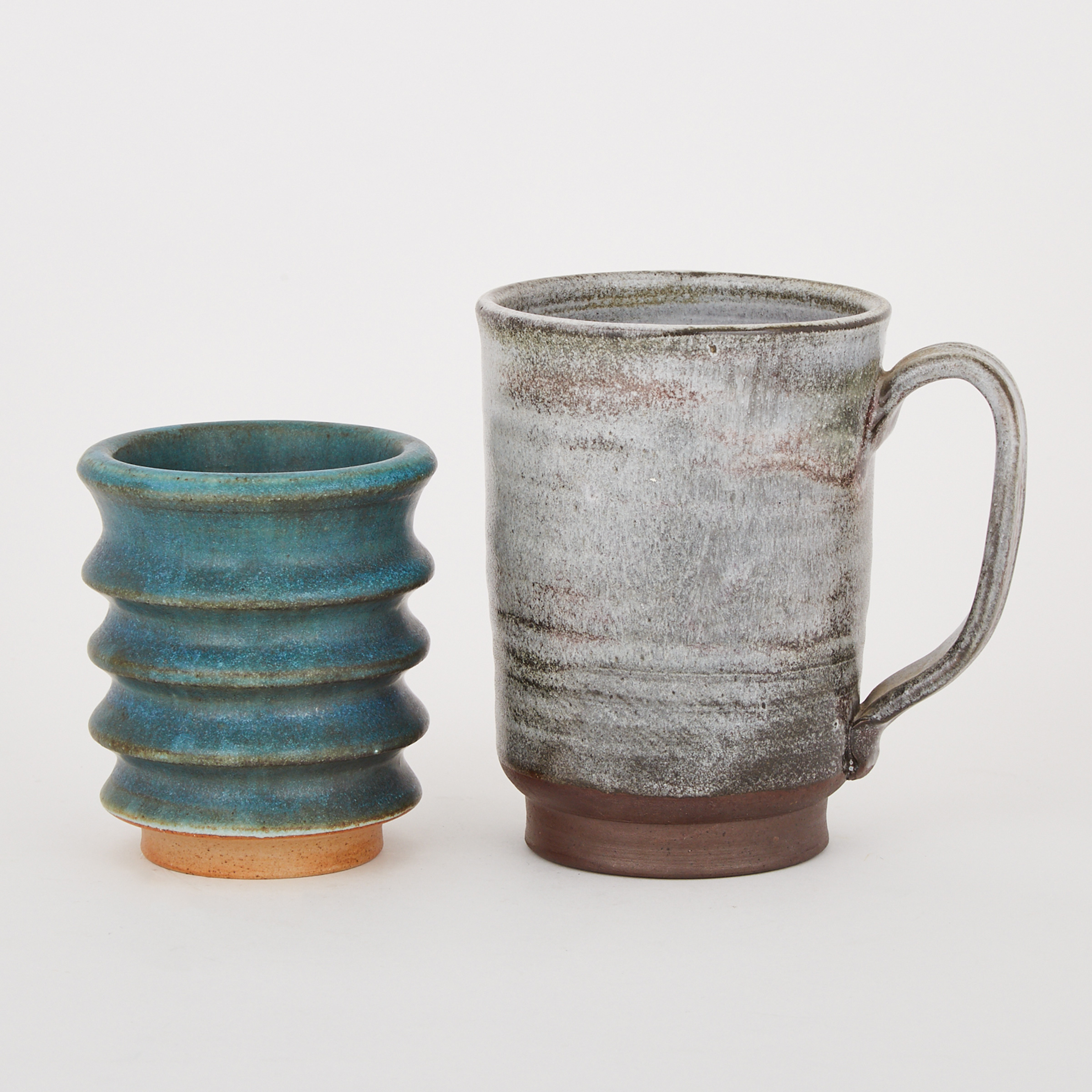 Two Deichmann Pottery Mugs, mid-20th century