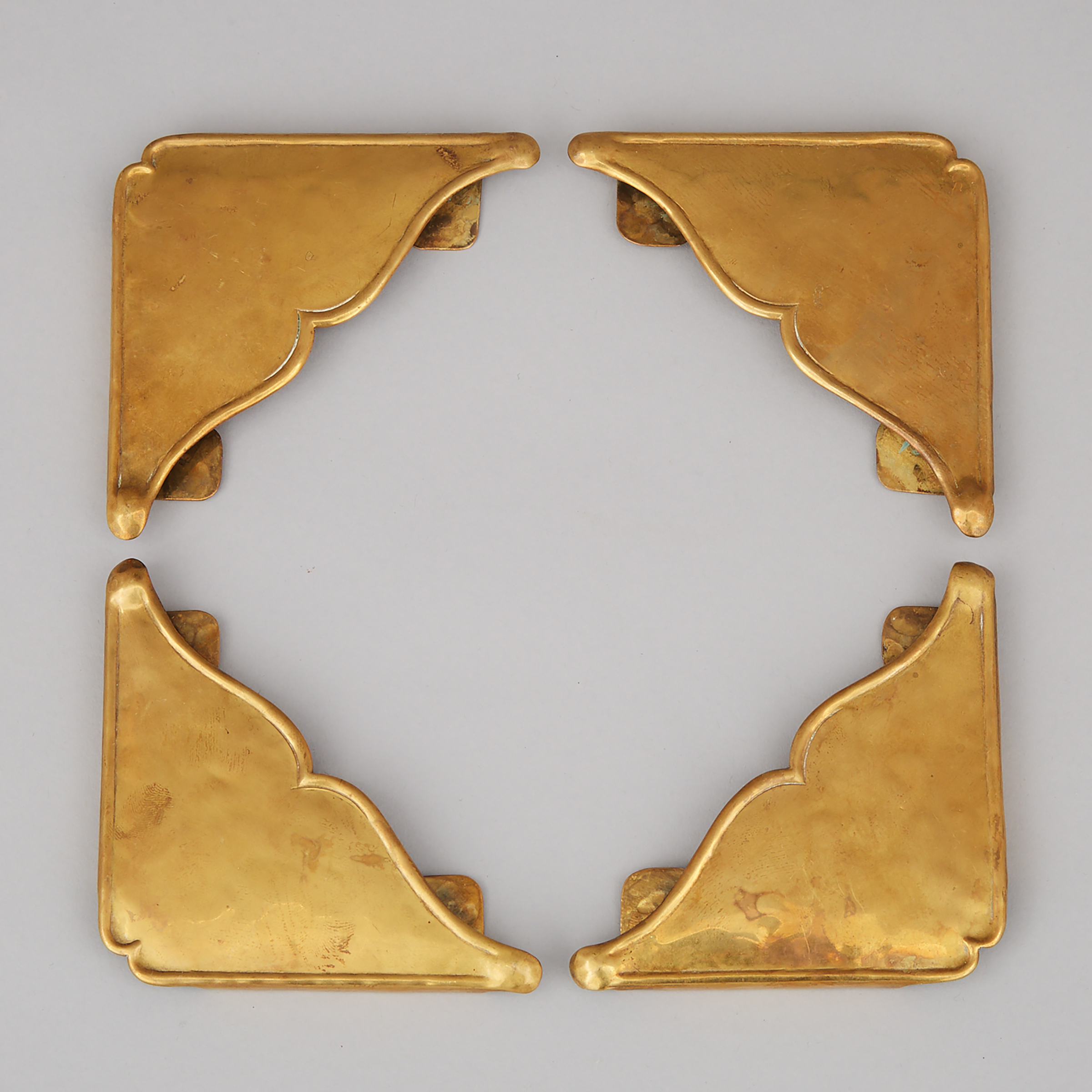 Paul Beau (1871-1941) Set of Hammered Brass Desk Blotter Corners, Montreal, early 20th century