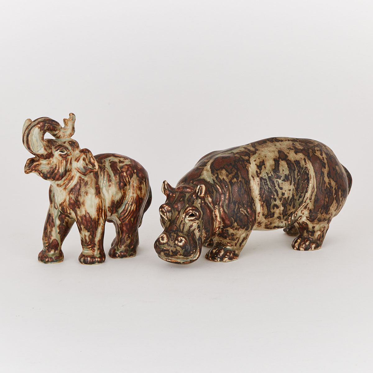 Royal Copenhagen Mottled Brown Glazed Stoneware Elephant and Hippopotamus, Knud Kyhn, mid-20th century