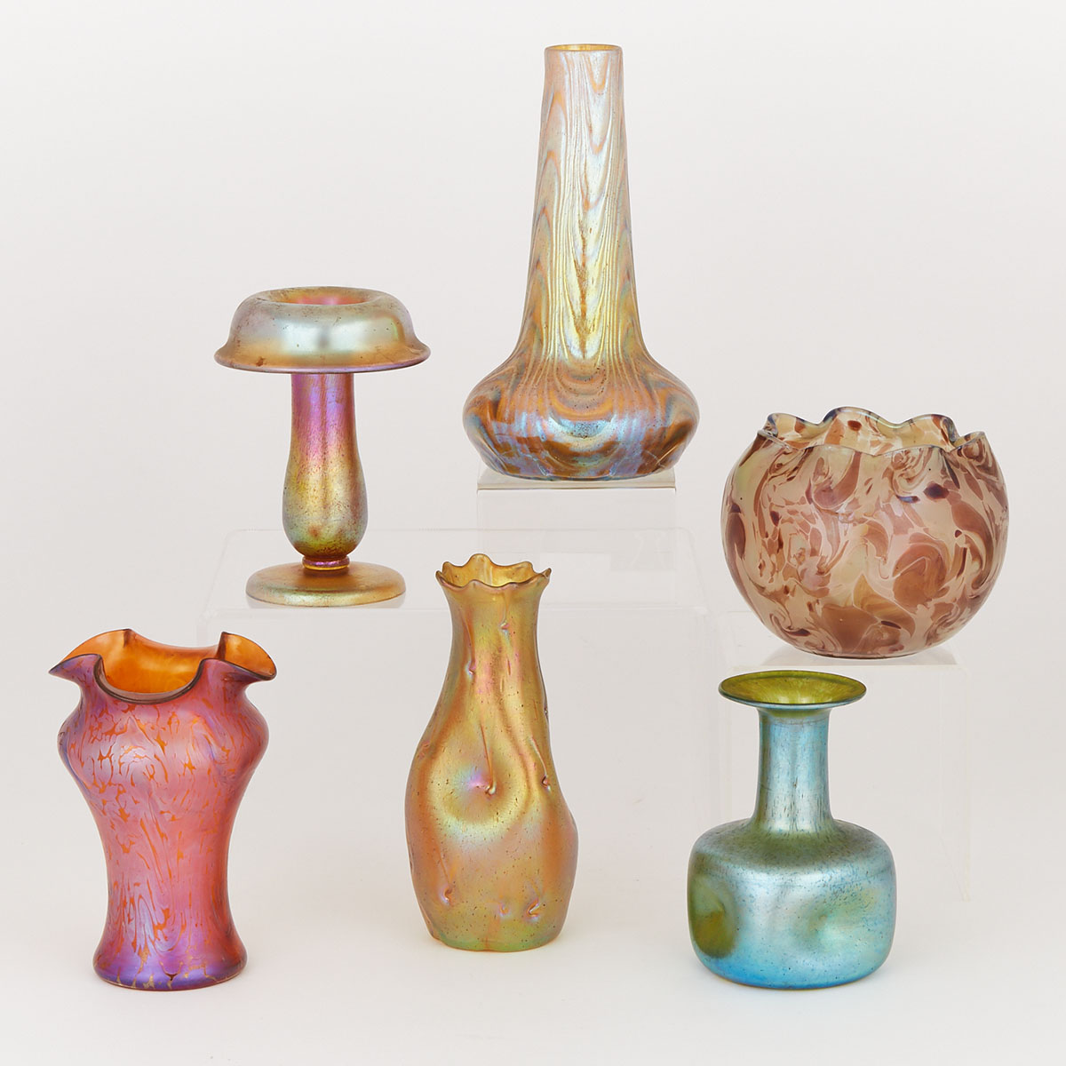 Six Bohemian Iridescent Coloured Glass Vases, early 20th century