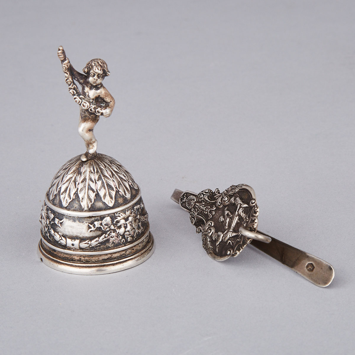 German Silver Table Bell, Storck & Sinsheimer, Hanau and a Dutch Chatelaine Hook, c.1900