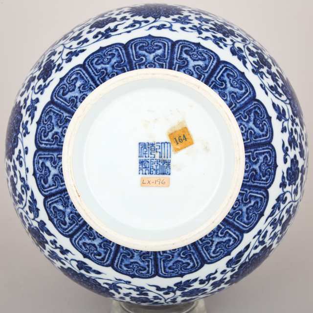 A Ming-Style Blue and White ‘Lotus’ Bottle Vase, Qianlong Mark