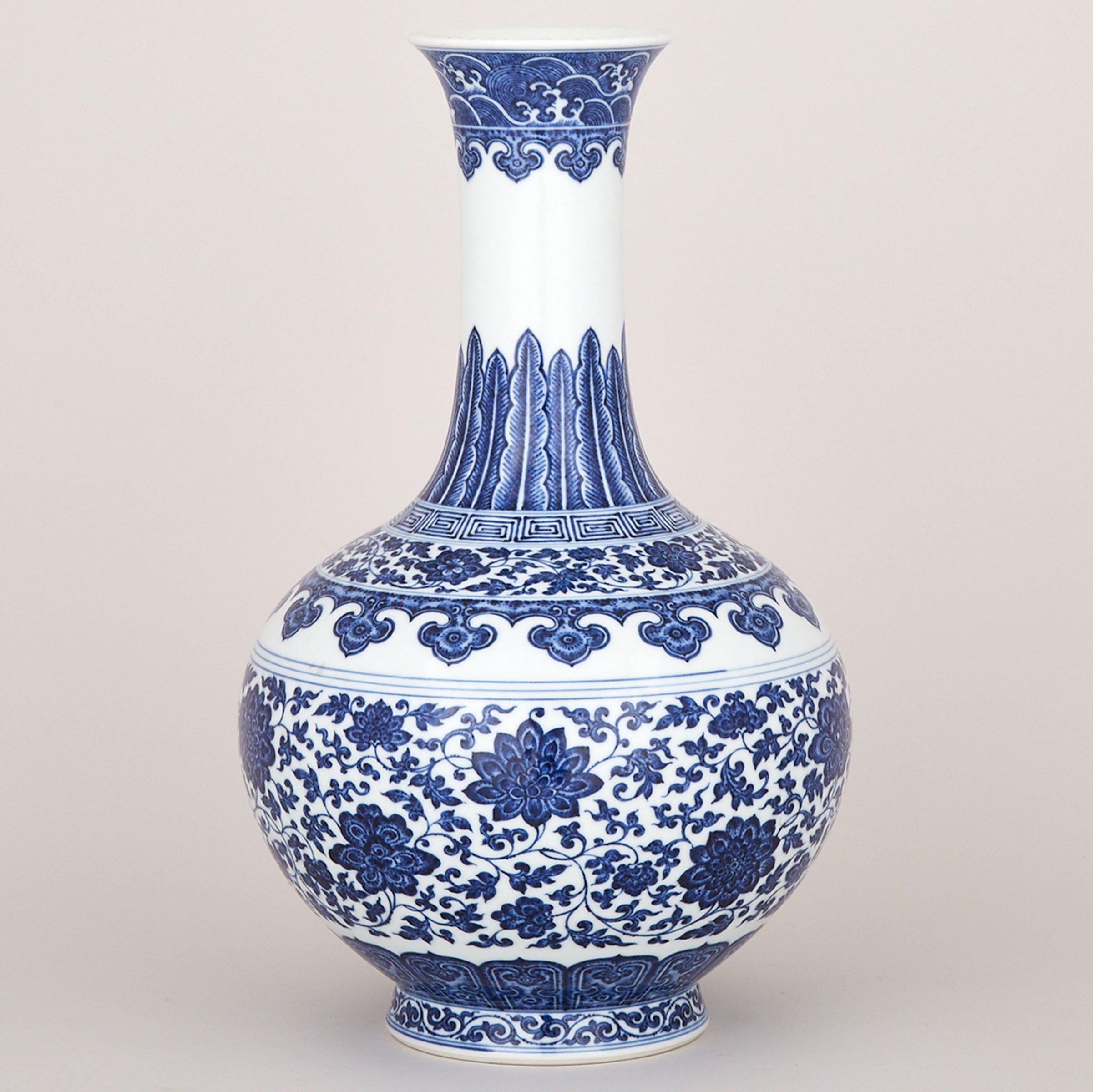 A Ming-Style Blue and White ‘Lotus’ Bottle Vase, Qianlong Mark