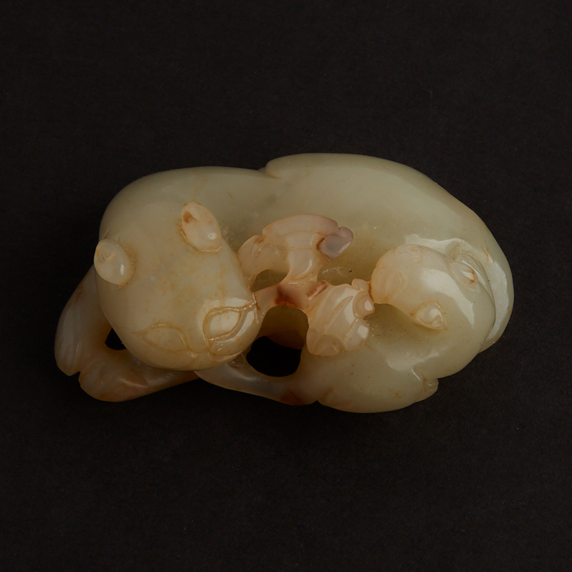 A Celadon Jade Carving of Two Cats