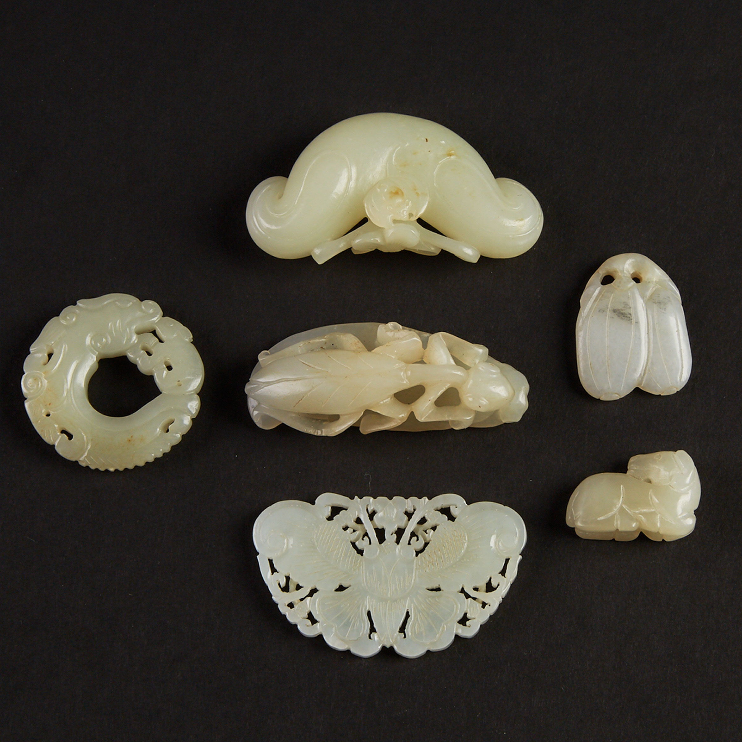 A Group of Six White Jade Carvings 