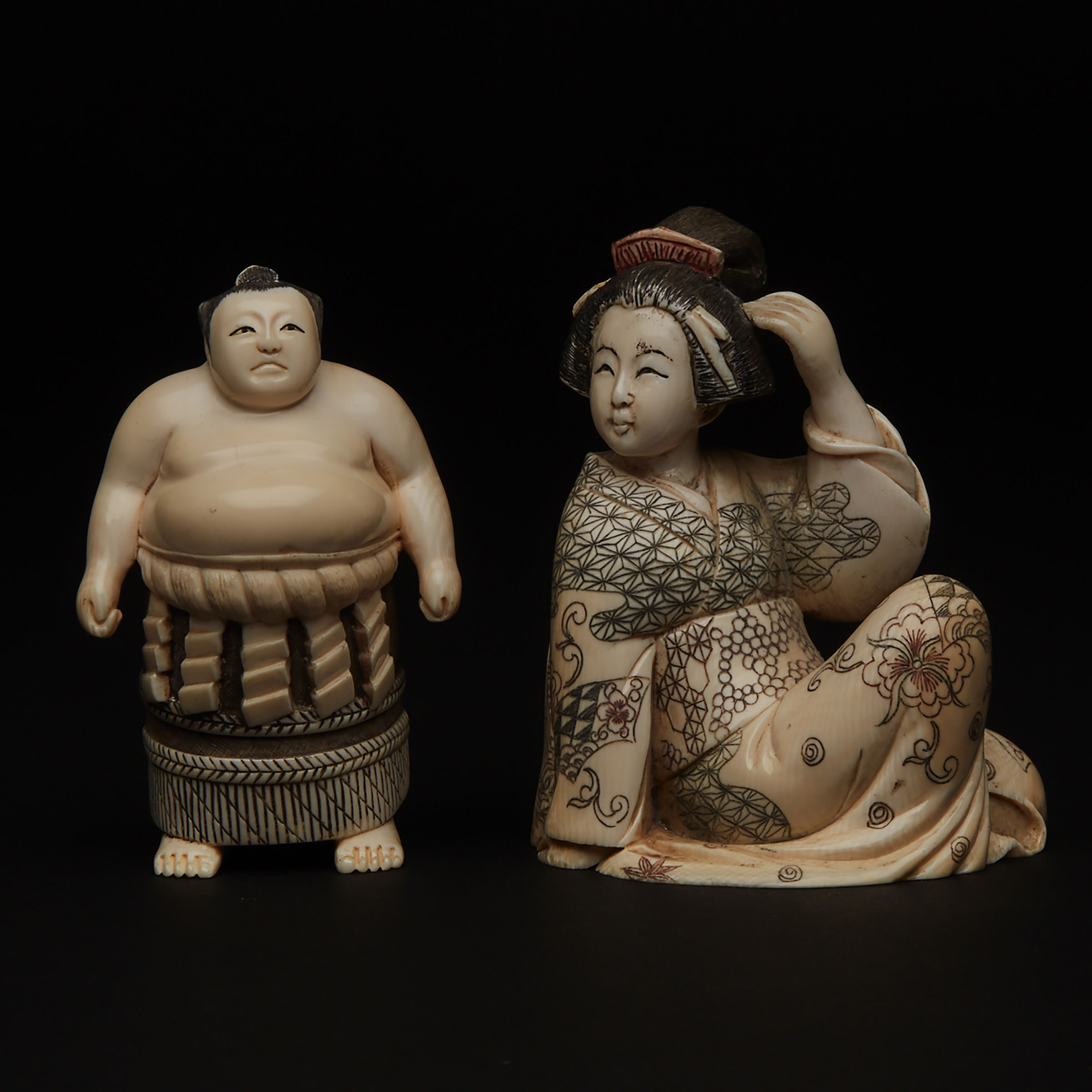 Two Ivory Okimono of a Geisha and a Sumo Wrestler
