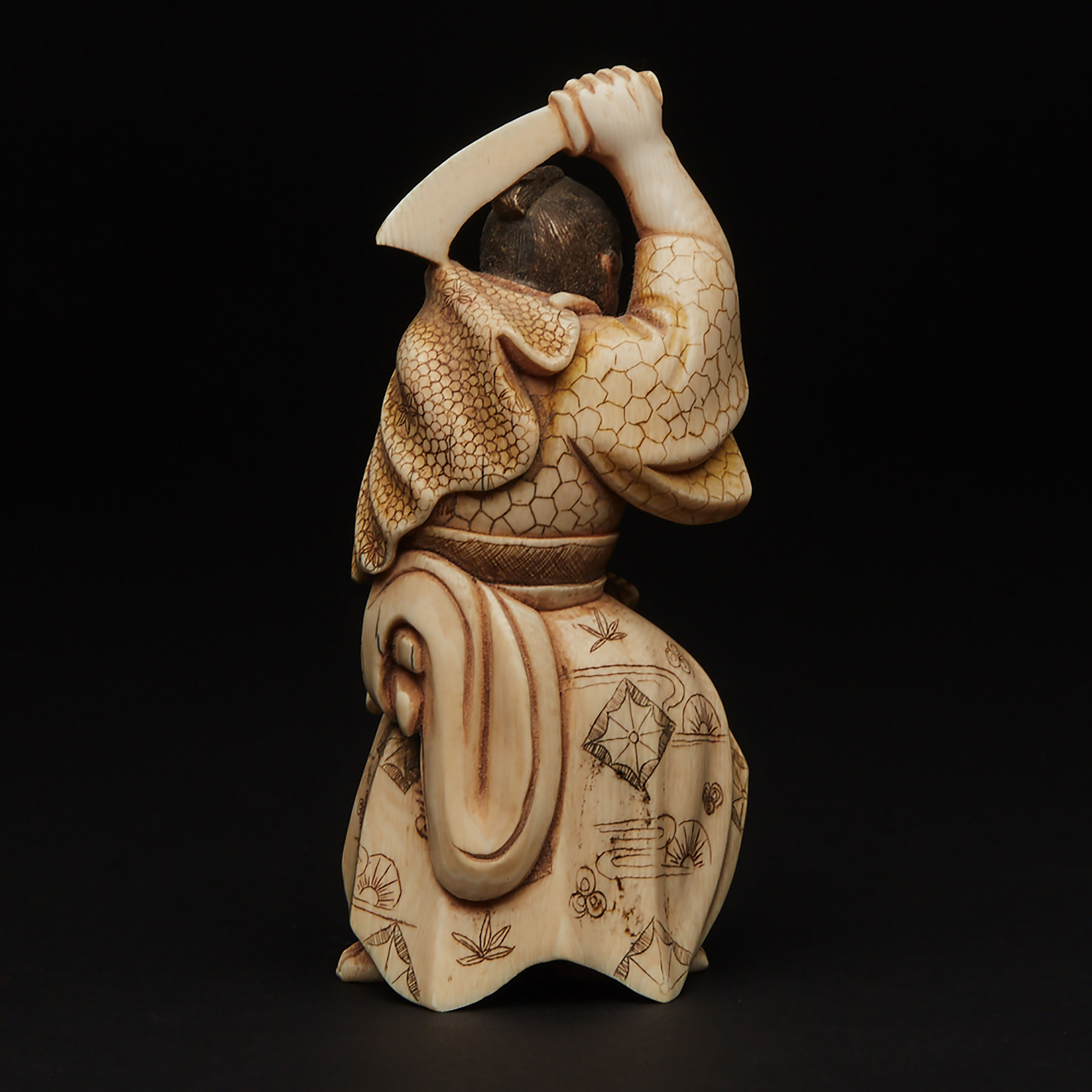 An Ivory Okimono of a Samurai